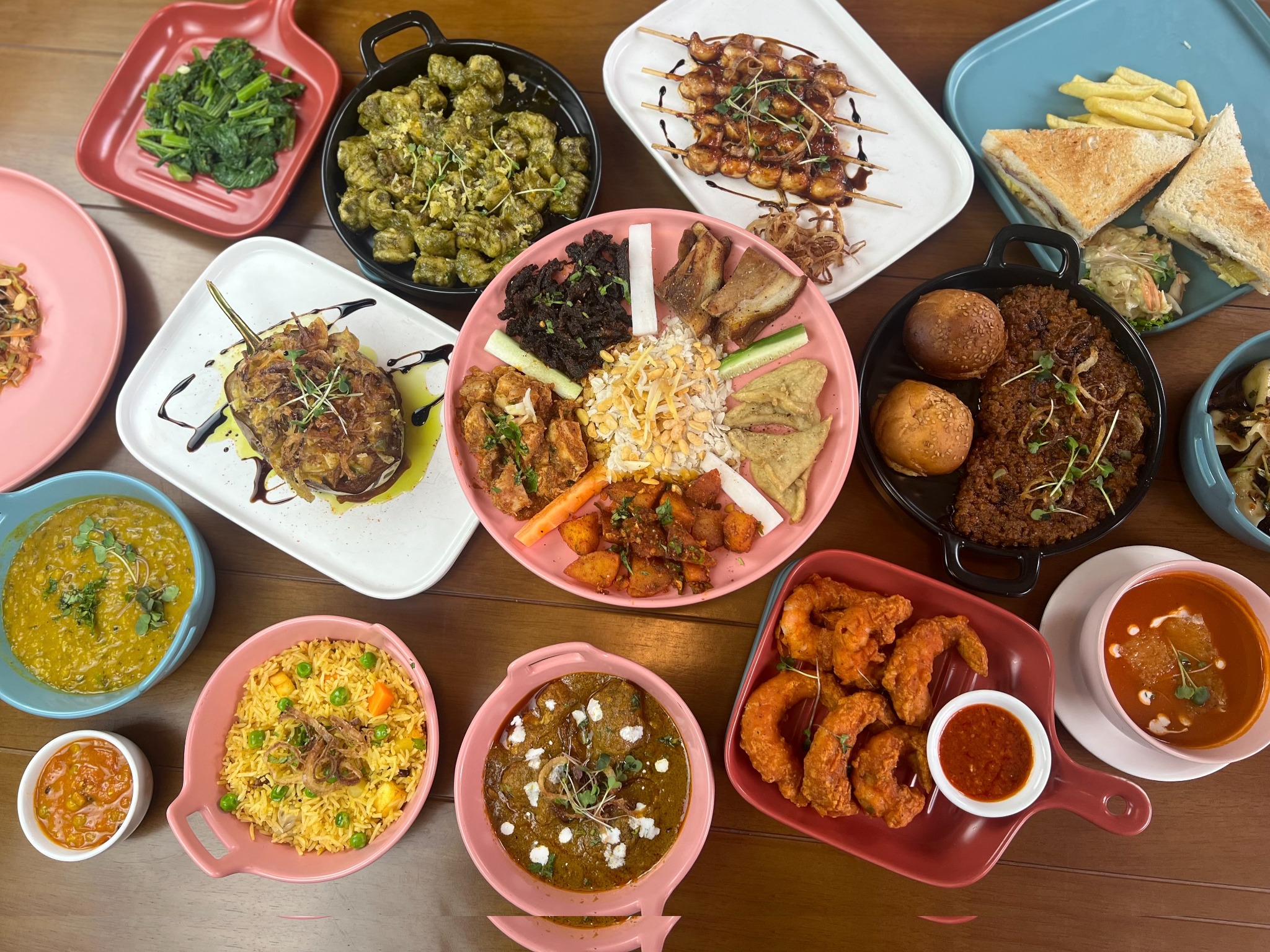 A table filled with dishes at The Lawn